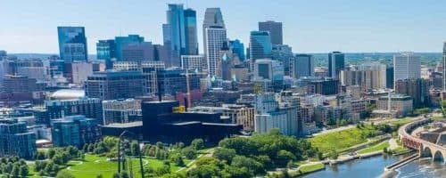 Downtown Minneapolis skyline along the Mississippi River — MSP Car Service luxury car service and MSP airport transportation